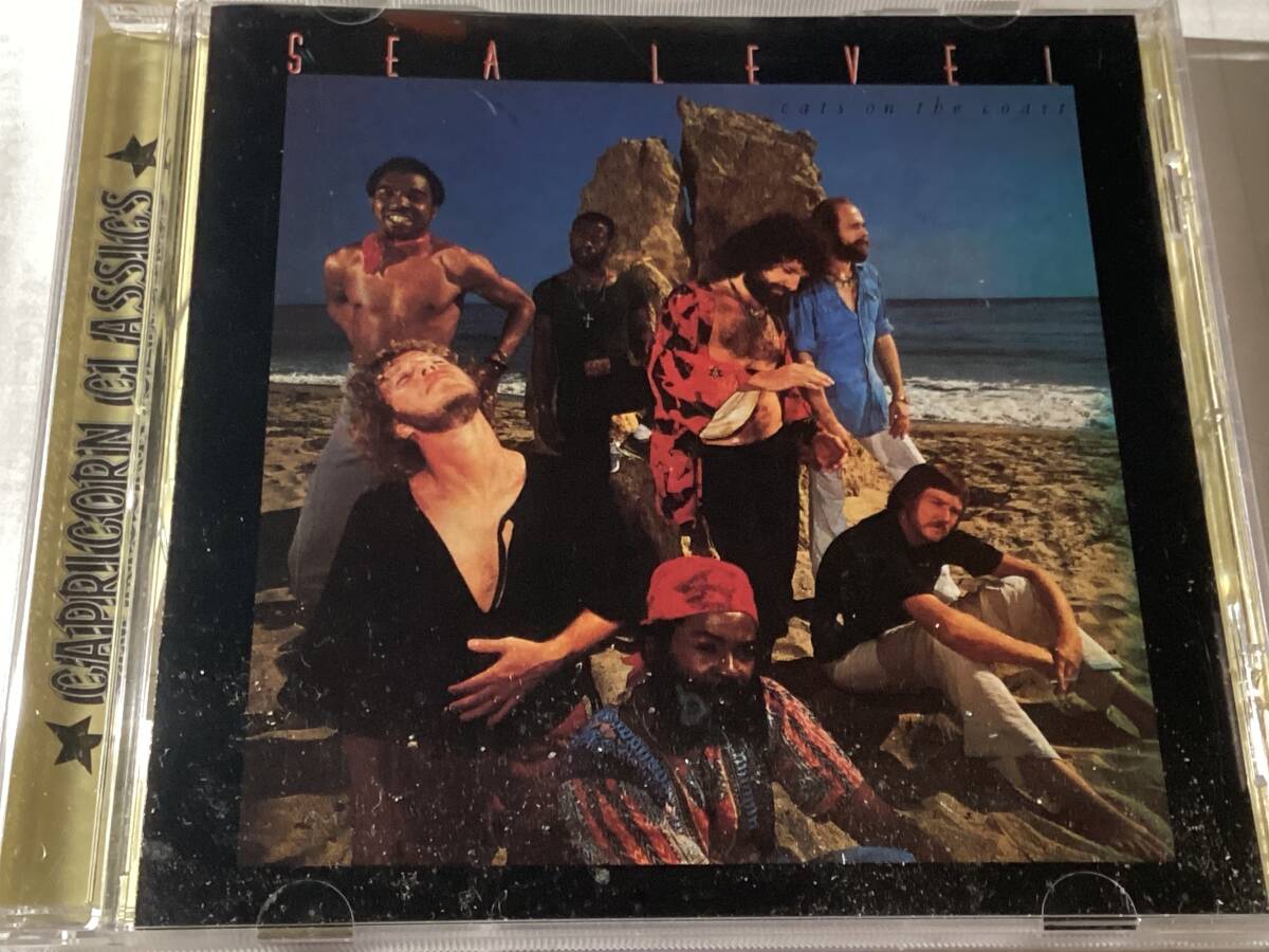 Front cover of the Sea Level "Cats on the Coast" CD case showing the band posed on a beach.