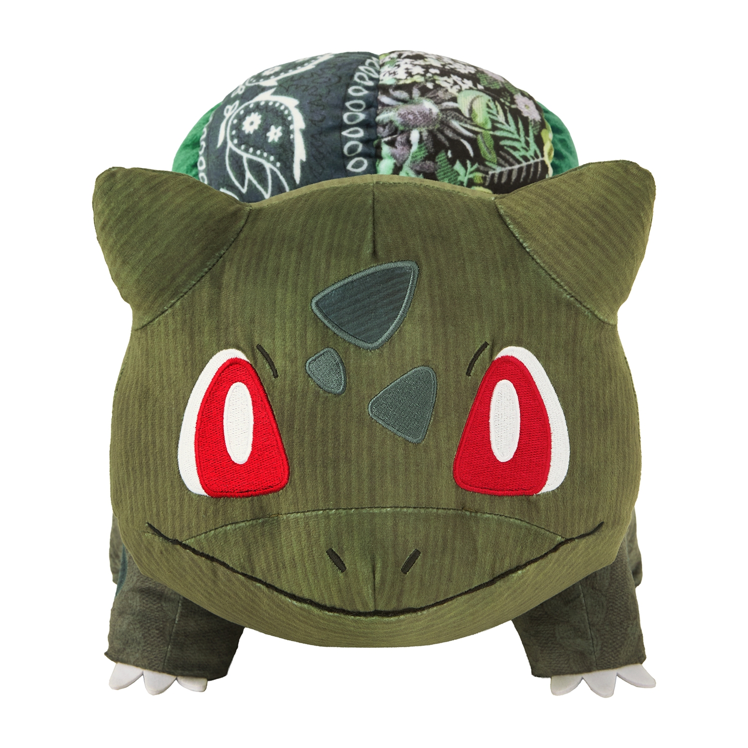 Front view of a Bulbasaur plush toy in corduroy-like fabric with red eyes and a patterned bulb on its back.