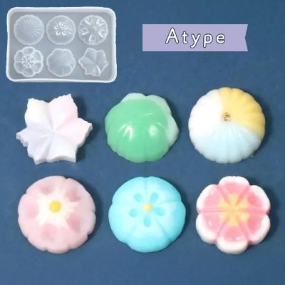 Silicone mold (small inset) and six flower-shaped wagashi cabochon samples arranged on a blue background labeled "Atype".