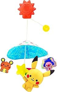 A baby stroller mobile showing a blue umbrella canopy with hanging plush Pokémon characters, including Pikachu.