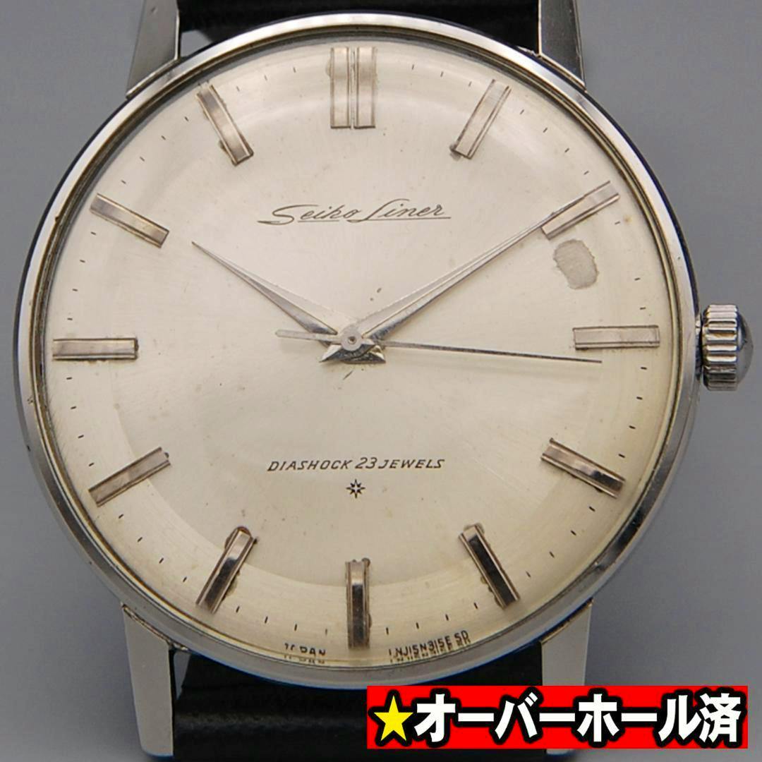 Close-up front view of a Seiko Liner hand-wind watch showing its cream SD dial, applied baton hour markers, and silver hands.