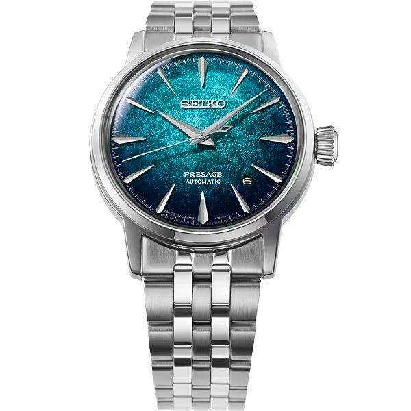 Front view of the Seiko Presage Cocktail Time HCB001J wristwatch showing an emerald textured dial and metal bracelet.