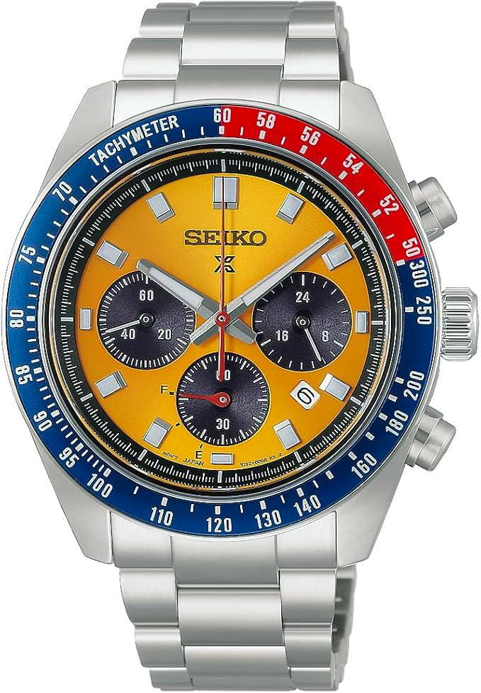 Seiko Prospex Speedtimer Solar Chronograph with a large bright yellow dial, three dark subdials, blue-and-red tachymeter bezel, and stainless steel bracelet.