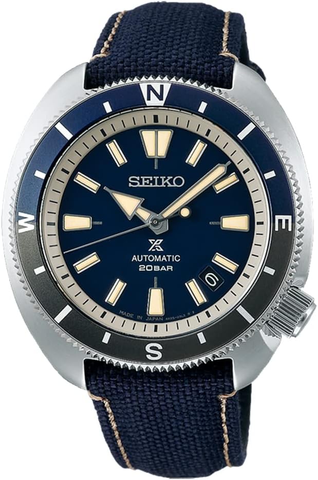 Front view of the Seiko Prospex mechanical automatic Turtle SRPG15J1 men's watch with a navy dial, compass-marked bezel, and navy fabric strap.