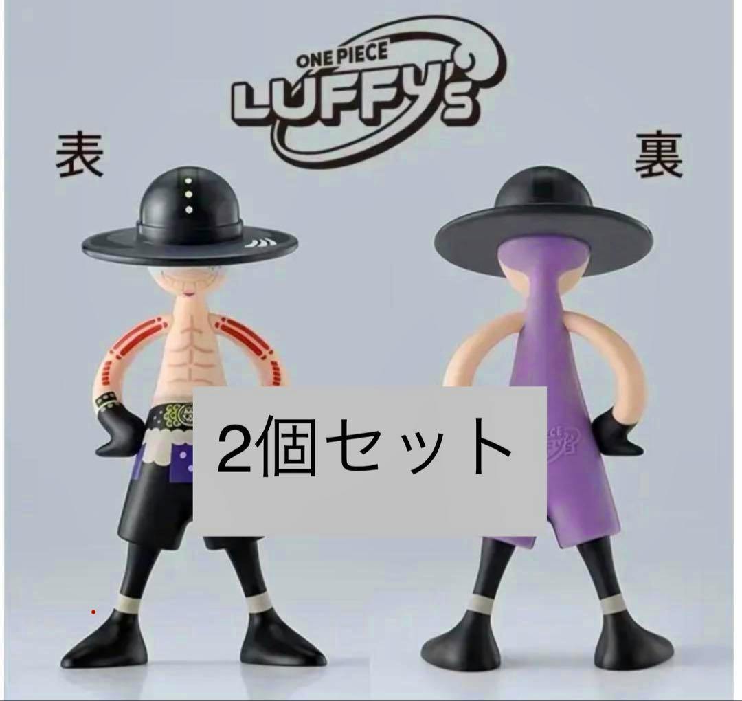 Front and back views of the One Piece Luffy's plastic figure shown side-by-side with a '2個セット' overlay.