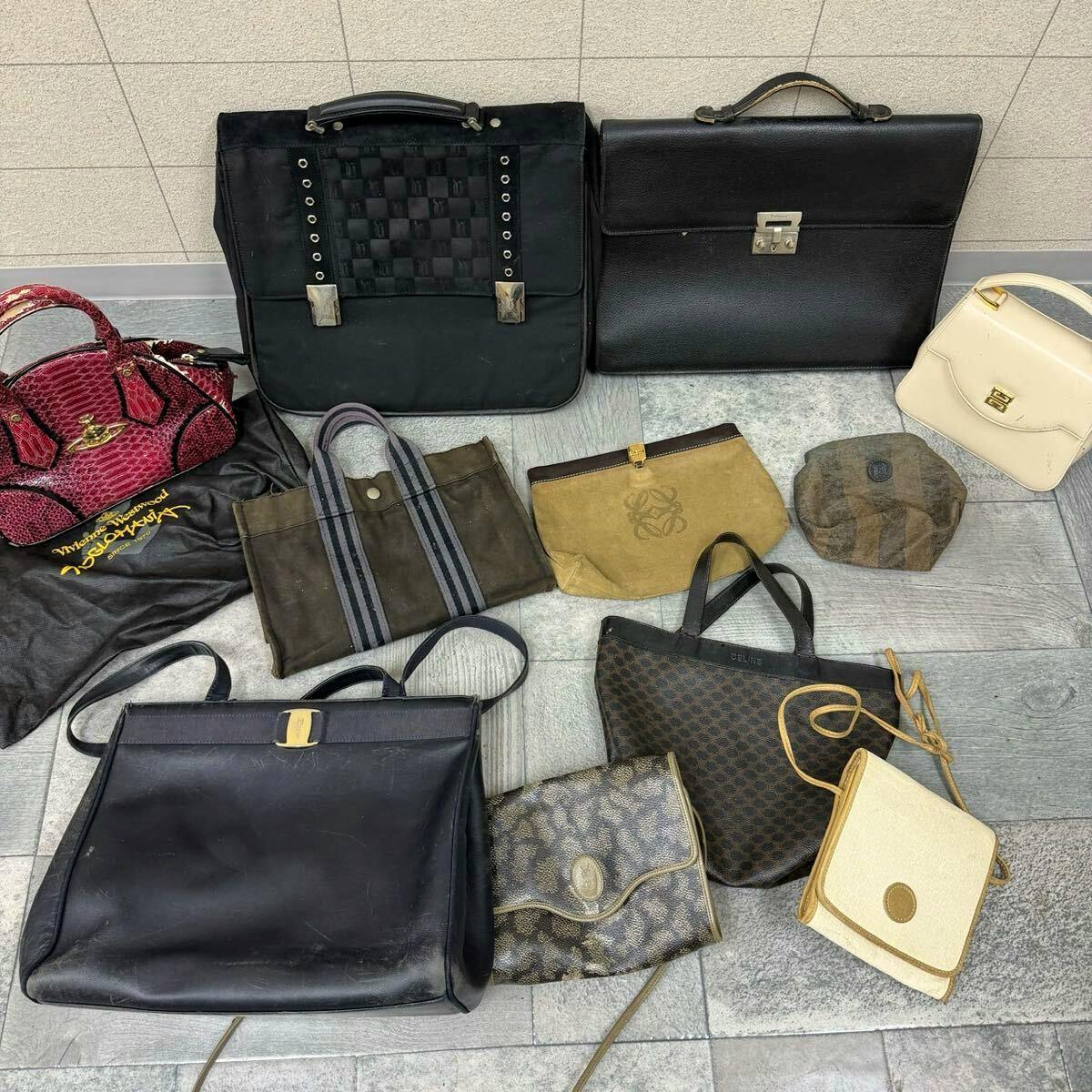 Assorted bags from a set arranged on a tiled floor, photographed from above.