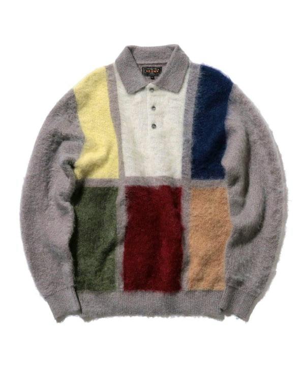 Shaggy knit polo sweater laid flat with gray base and multicolored rectangular panels on a white background.