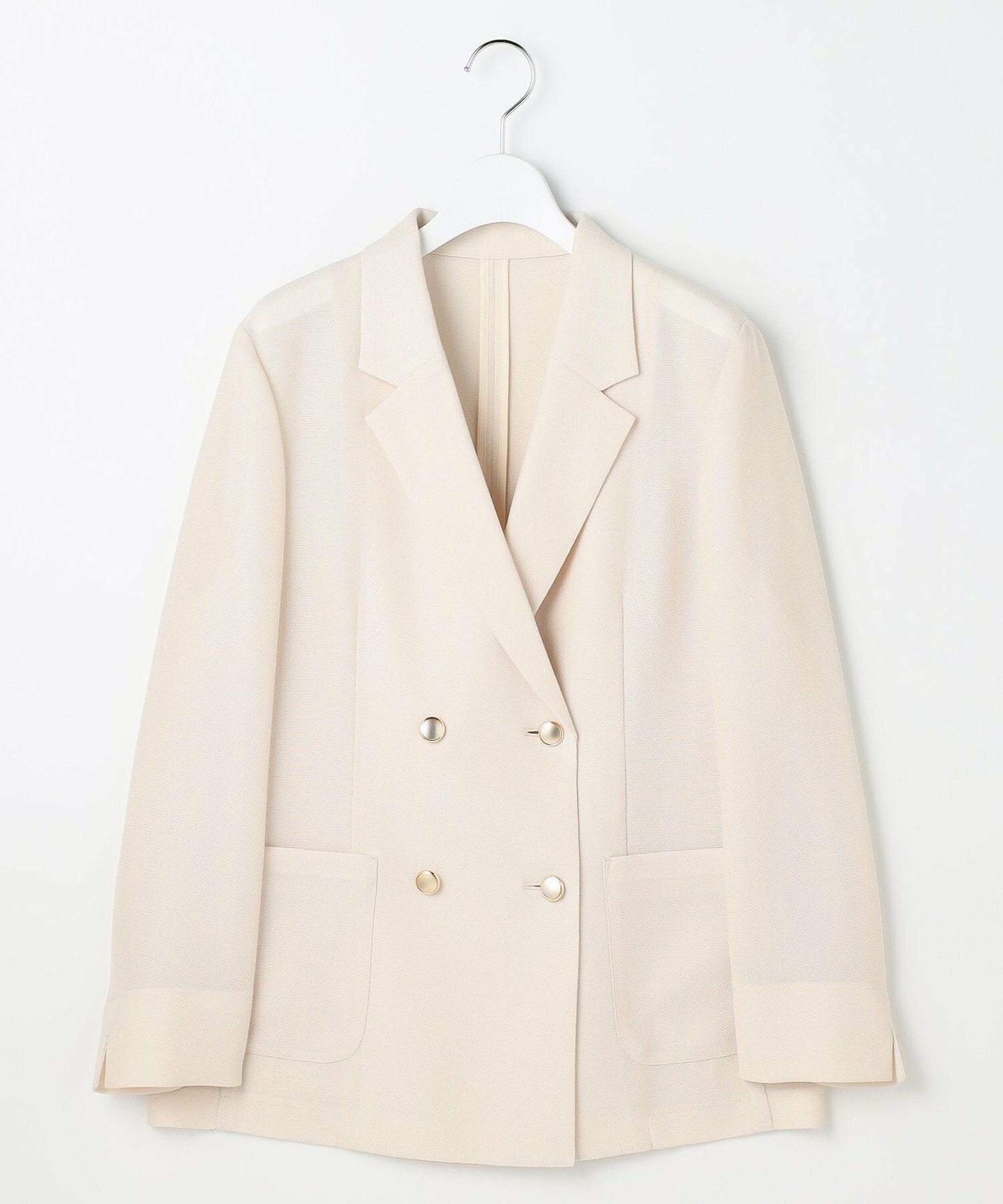 Front view of the women's sheer-mesh double-breasted jacket hanging on a hanger.