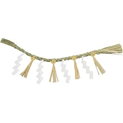Jute shime rope with hanging paper shide and tassels on a white background.
