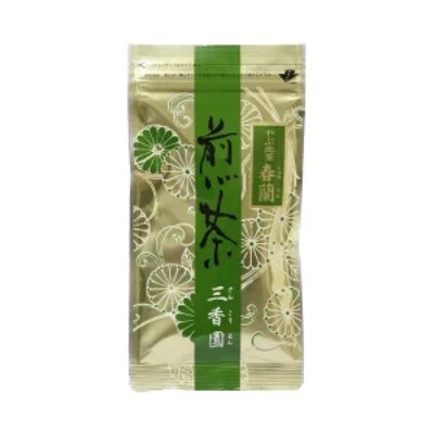 Front view of the product's gold-and-green package of Shizuoka loose-leaf green tea labeled 「煎茶 春蘭」 on a white background.