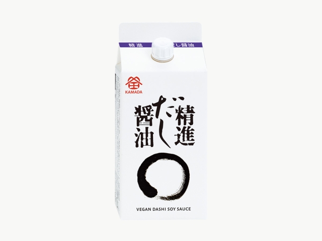 Single white carton of 精進だし醤油 (vegan dashi soy sauce) with a screw spout and black circular logo.