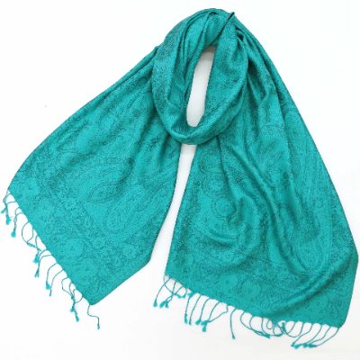 Teal jacquard-woven silk stole with tassels, laid flat and looped.