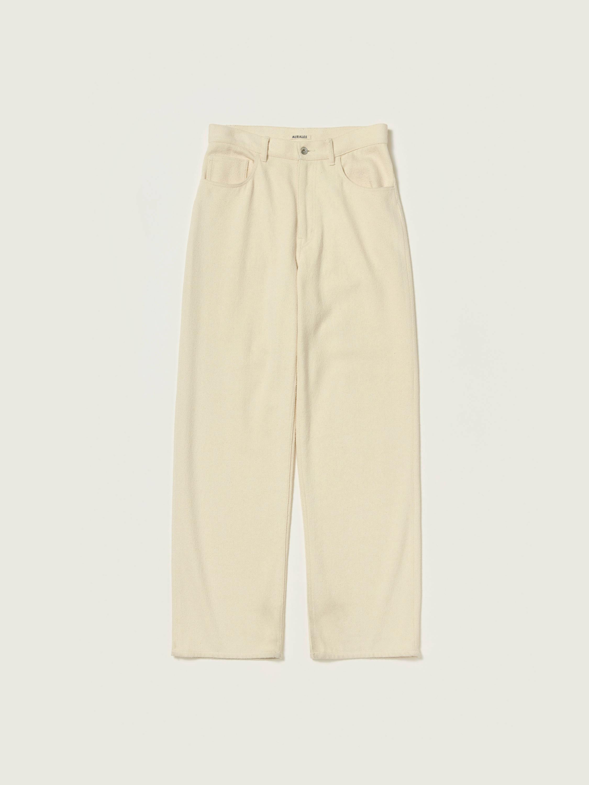 Flat-lay photo of the women's silk wide pants in a light cream color showing the front waist, pockets and full-length legs.
