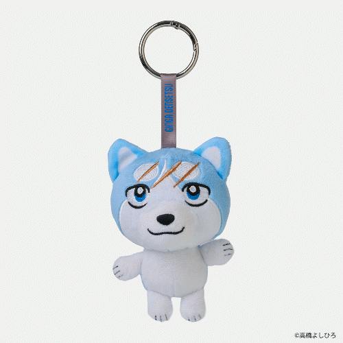 A blue-and-white plush toy keychain with a character face and a metal split ring attached.