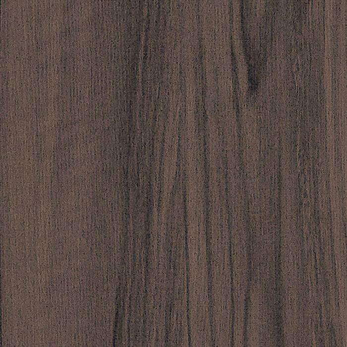 Close-up of a brown wood-grain patterned PVC wallpaper.