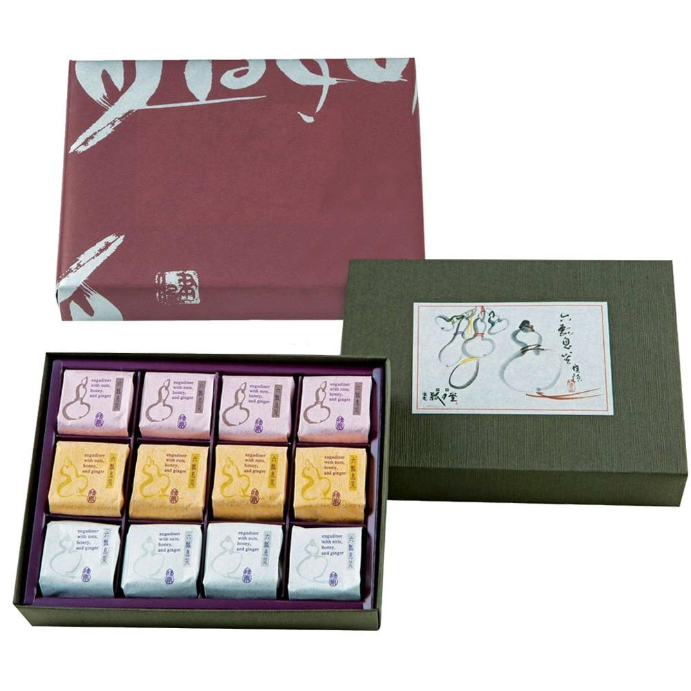 A gift box showing twelve individually wrapped 六瓢息災 cookies in three different colored wrappers with the box lid visible.