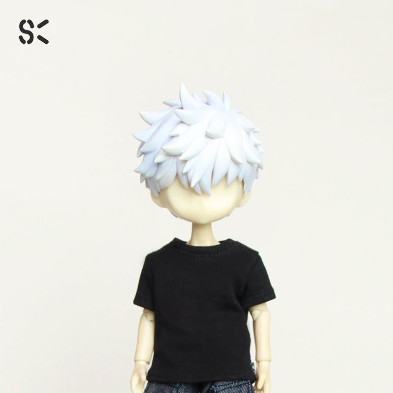 Front view of a doll wearing a black slim T-shirt on a plain light background.