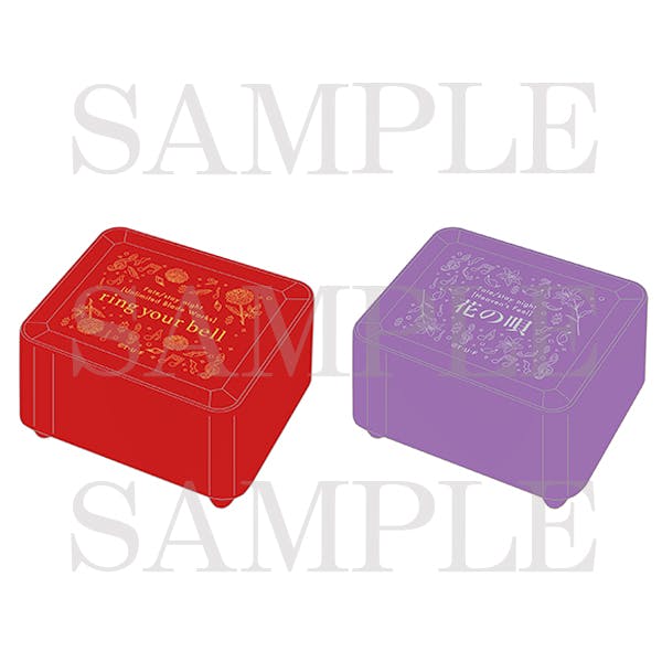 Illustrated image showing two rectangular skeleton music boxes in red and purple with decorative designs on their tops.