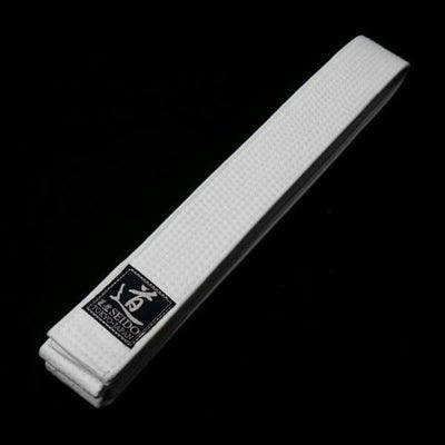 A slim white canvas belt folded with a small black brand label on a black background.