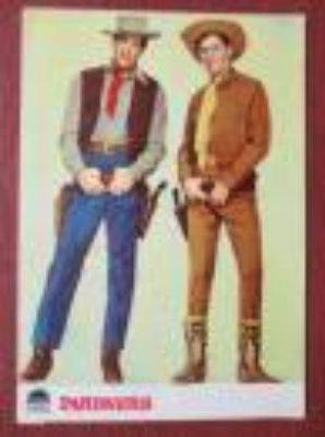 Pamphlet cover showing two illustrated cowboys standing side by side against a plain background.