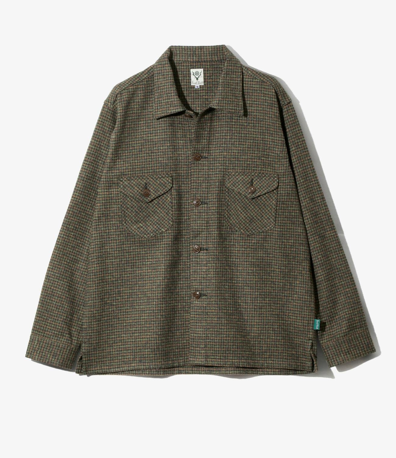 Front view of the Smokey Shirt cotton plaid men's shirt laid flat, showing the collar, button closure, and two chest flap pockets.