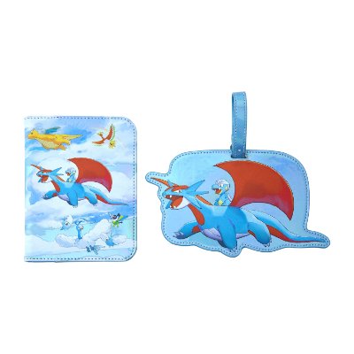 Blue passport case and matching luggage tag featuring a flying creature illustration on a white background.
