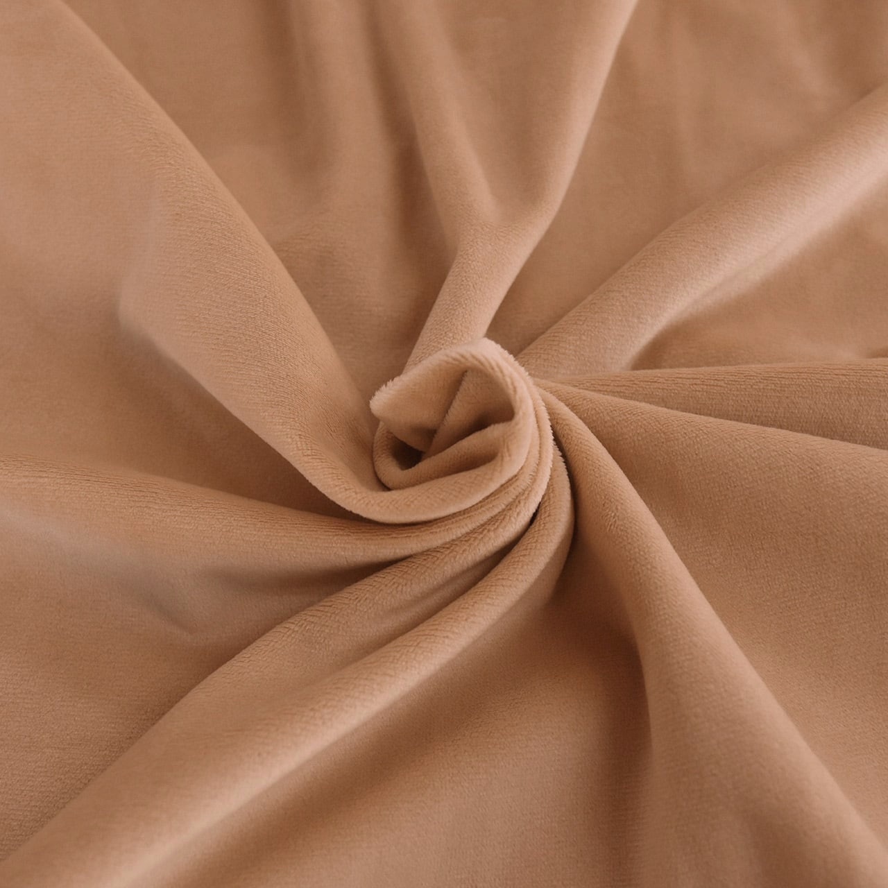 Terracotta beige short-pile polyester boa fabric for plush toys arranged in a spiral.