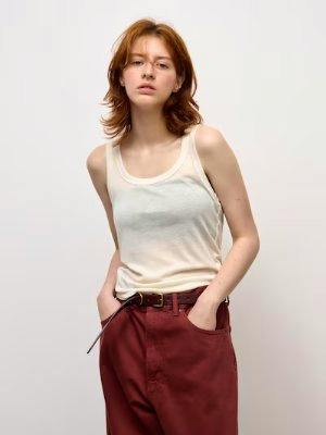 Model wearing the soft sheer tank top shown from the front.