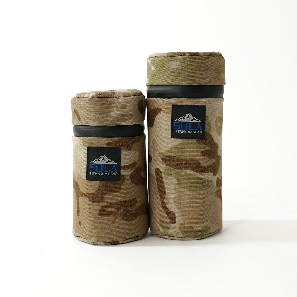 Two camouflage car cup holders with SOLA Titanium Gear logos on a white background.