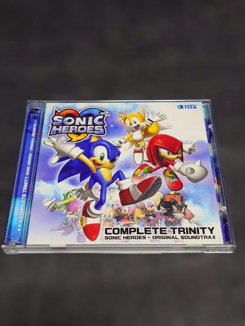 Front cover of the SONIC HEROES COMPLETE TRINITY CD (original soundtrack) showing Sonic, Tails, Knuckles and the title.