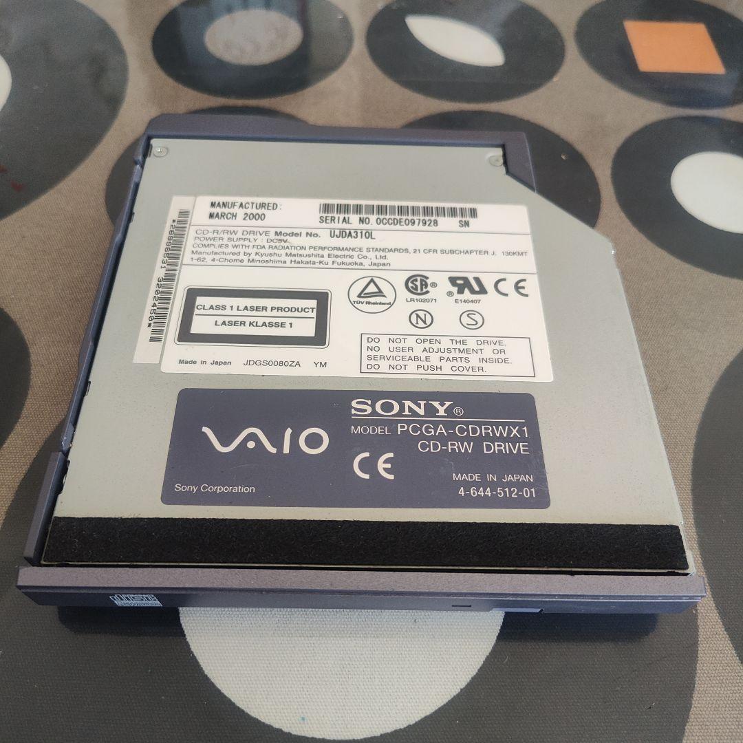 Top view of a Sony VAIO PCGA-CDRWX1 CD-RW drive showing labels and model plate.