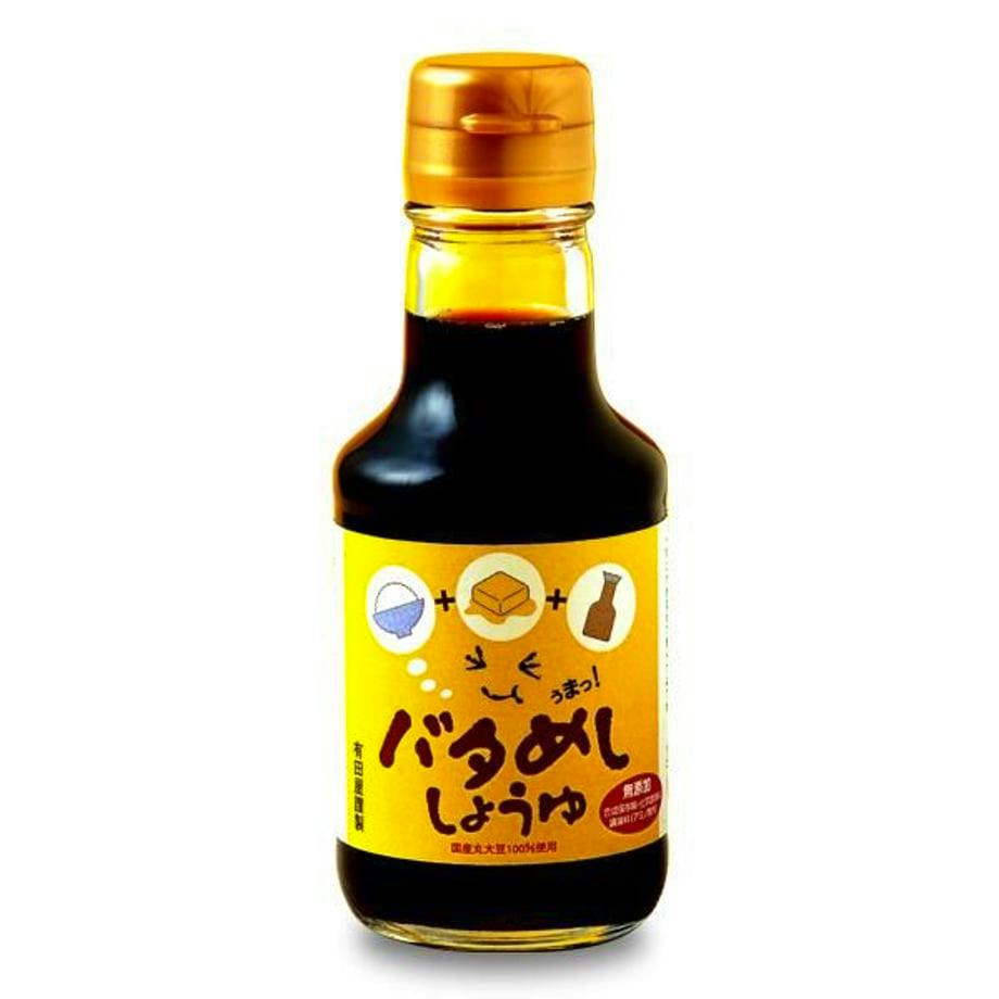 Front view of a glass bottle of バタめししょうゆ (butter rice soy sauce) with a yellow label.