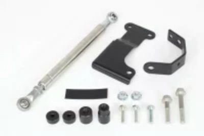 Front-fork damper kit parts including a rod, mounting brackets, bolts, and rubber bushings.