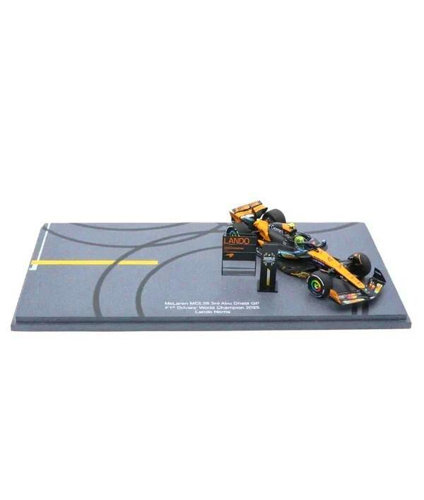 1/43 McLaren MCL39 #4 Lando Norris model car on a display base.