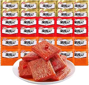 Plate of square spicy chewy snacks displayed in front of stacked individually wrapped snack packages.
