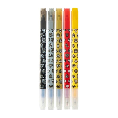 Five dot e pen markers in a 5-piece set shown on a white background, with dark, silver, gold, red, and yellow patterned barrels.