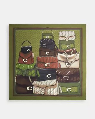 A square silk scarf laid flat showing a stacked tabby bag print on a green background.