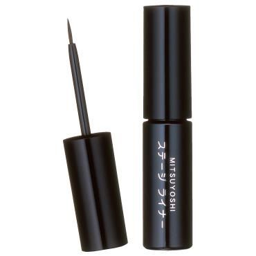 Black liquid eyeliner bottle with its brush applicator removed, showing Japanese text on the bottle.