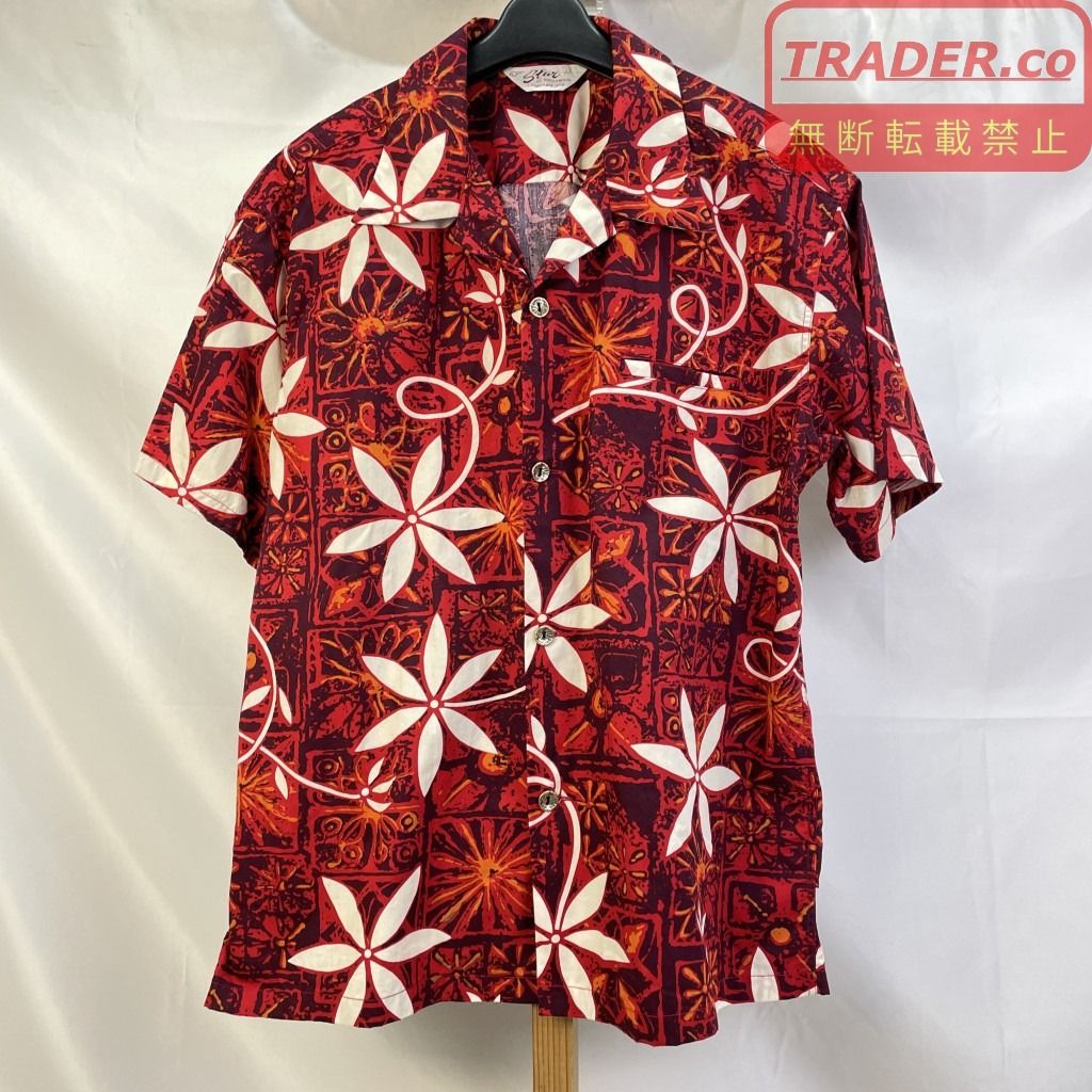 Red patterned men's short-sleeve cotton aloha (open) shirt on a hanger against a white background.