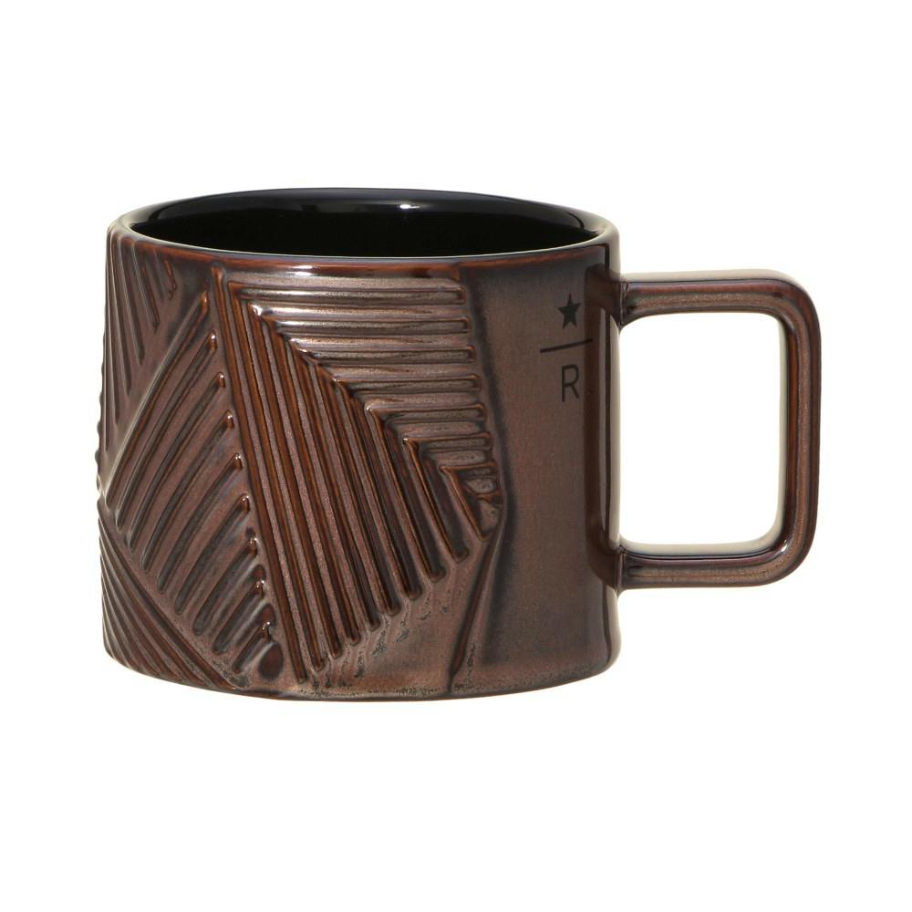 Front view of the Starbucks Reserve ceramic 355ml Sealing Copper mug showing a copper-colored textured geometric surface and a square handle.