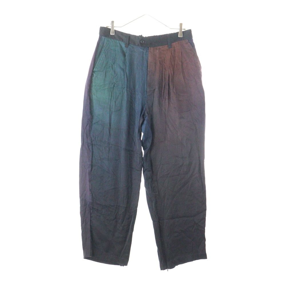 Front view of women's cupro wide easy trousers hanging on a hanger against a white background.