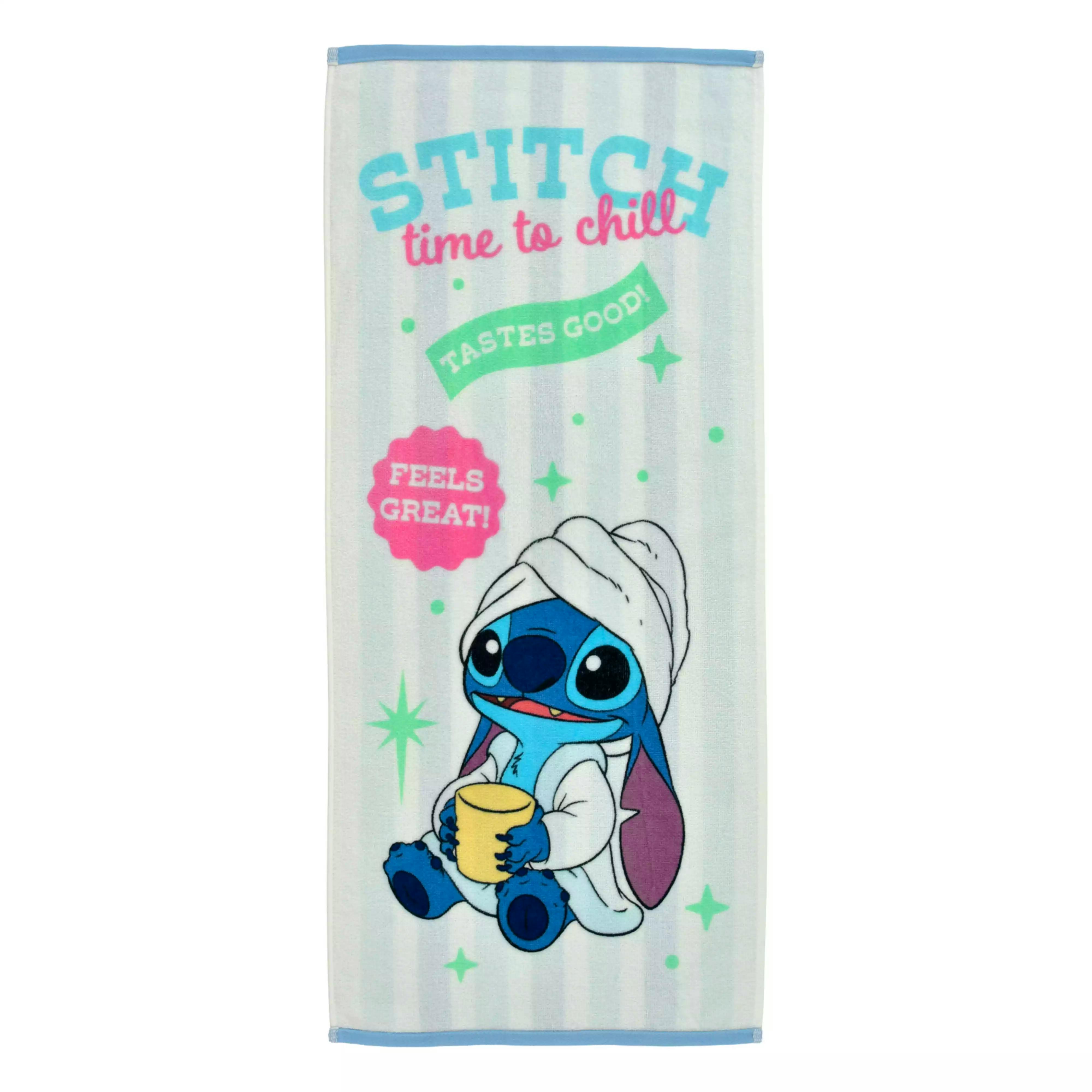 Front view of a cotton face towel featuring a printed Stitch character and decorative text.