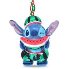 Blue Stitch plush keychain wearing a watermelon-themed outfit and hanging from a red chain.