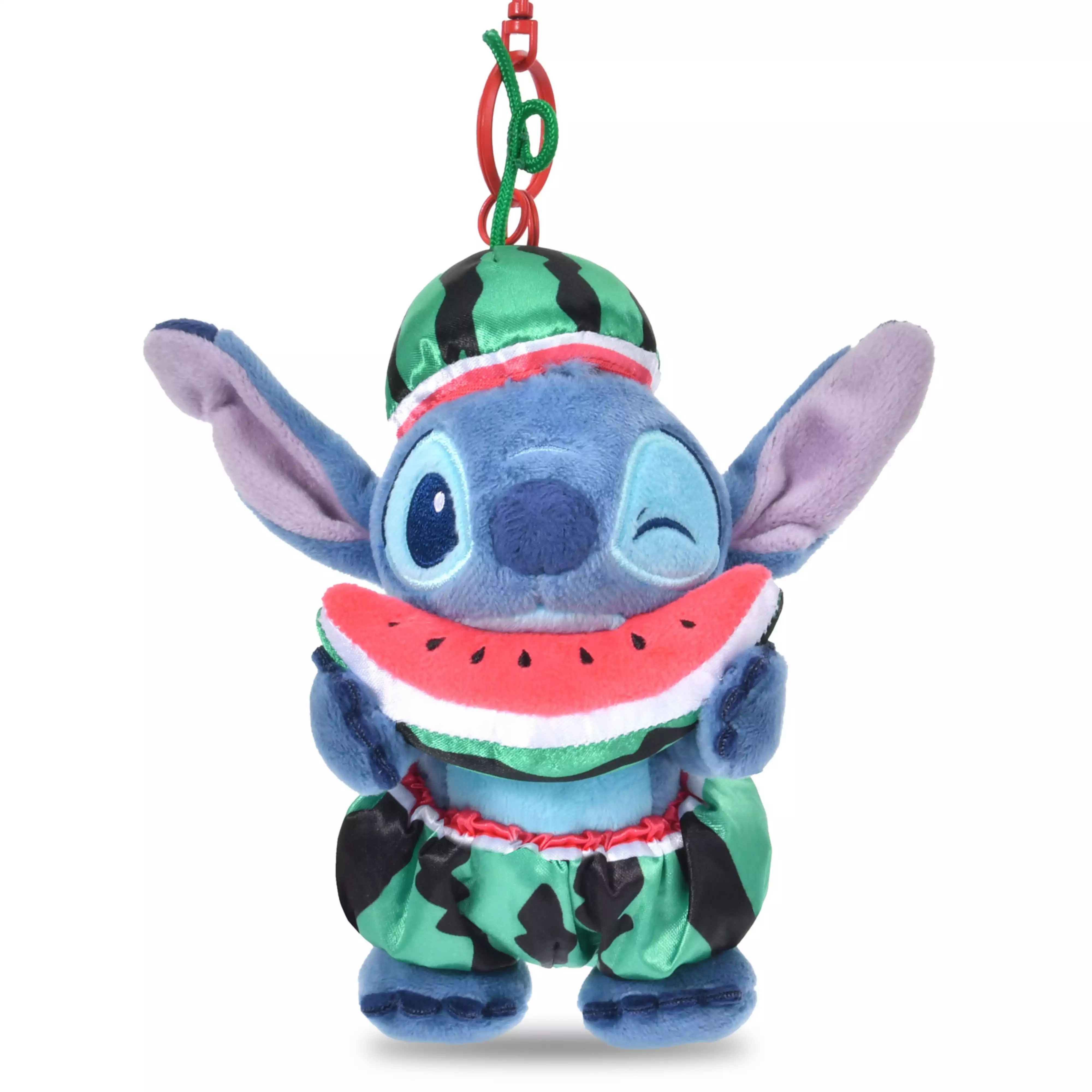 A Stitch plush keychain wearing a watermelon-themed outfit and holding a watermelon slice.