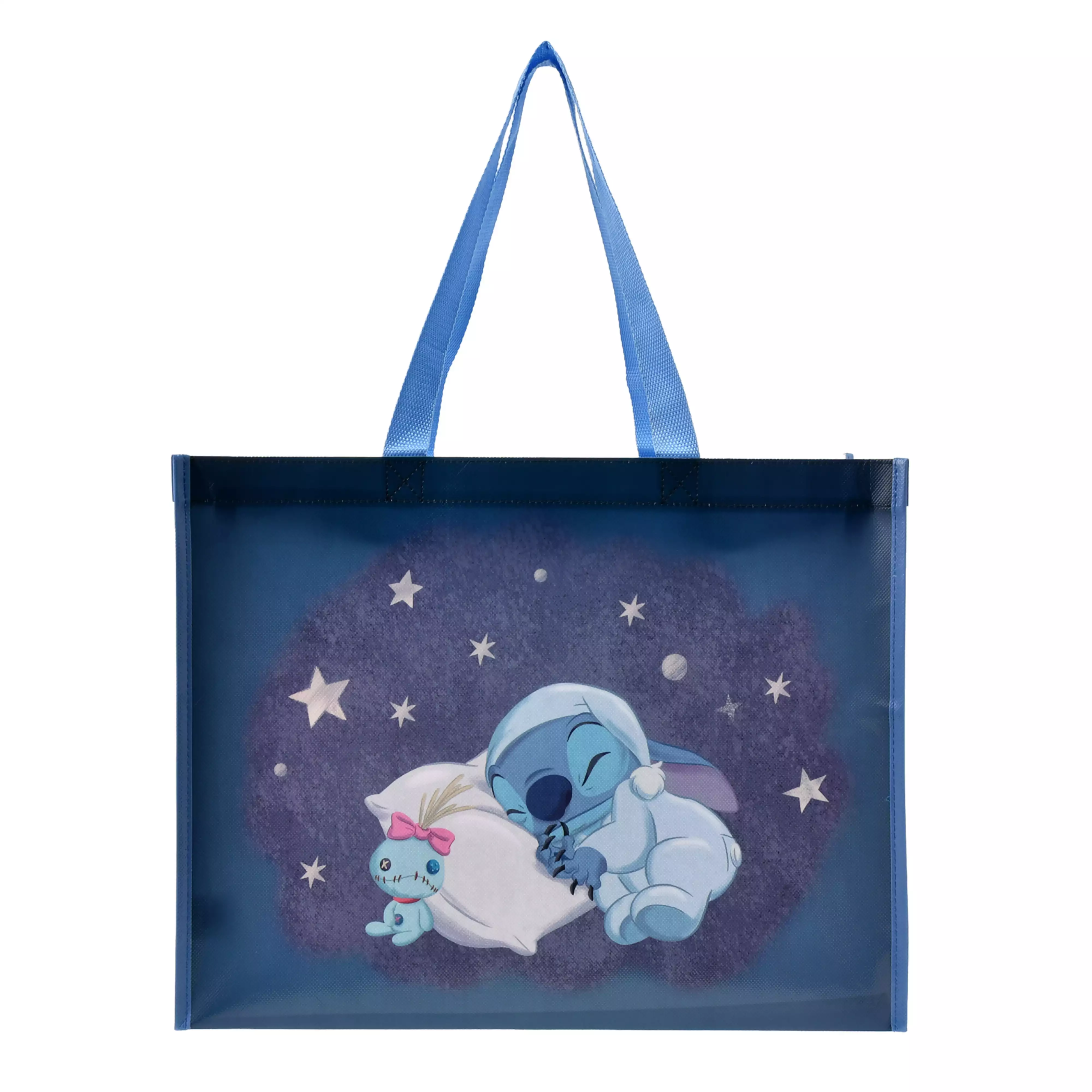 Front view of a blue reusable tote bag featuring Stitch and Scrump sleeping on a pillow with stars in the background.