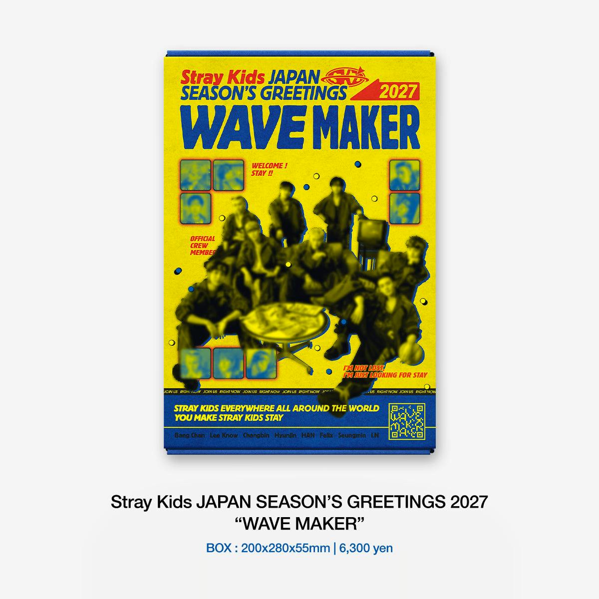 Front of the Stray Kids JAPAN SEASON'S GREETINGS 2027 “WAVE MAKER” box showing the yellow cover design and a blurred group photo.