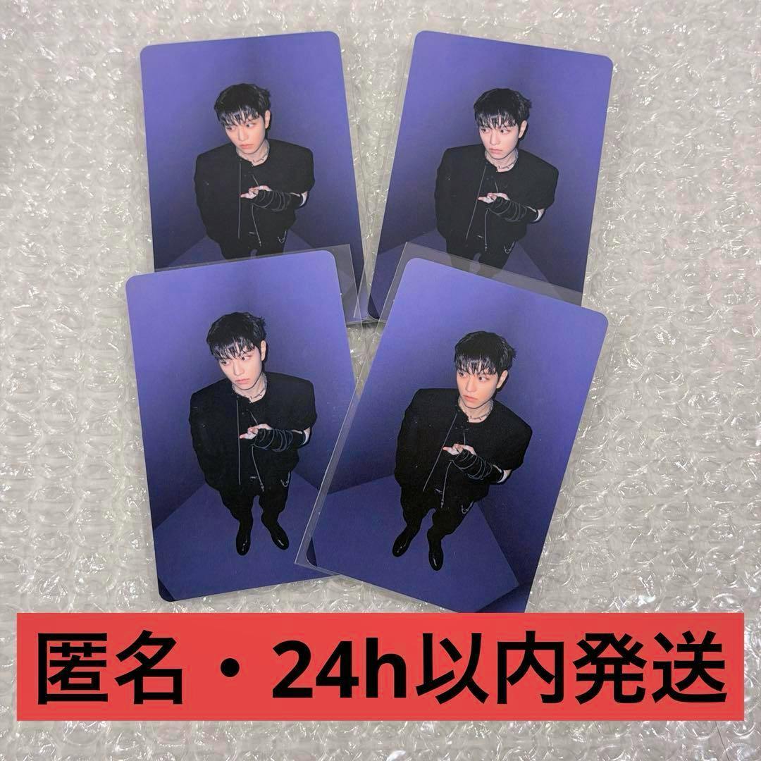 Four Seungmin (Stray Kids) photocards with a purple backdrop displayed on bubble wrap and a red shipping banner at the bottom.