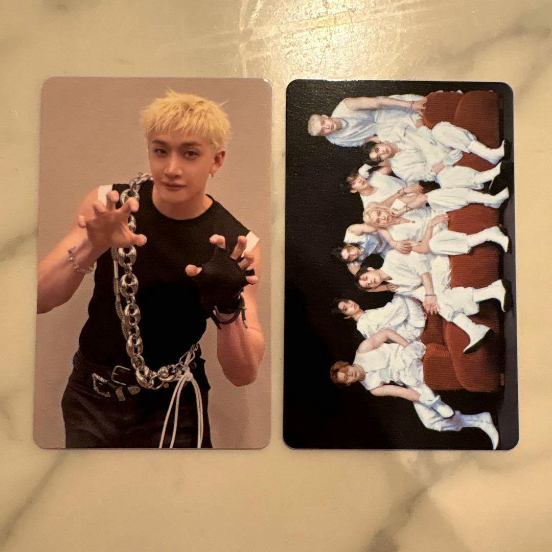 Two Stray Kids photocard fronts laid flat, with a single-member portrait on the left and a group photo on the right.