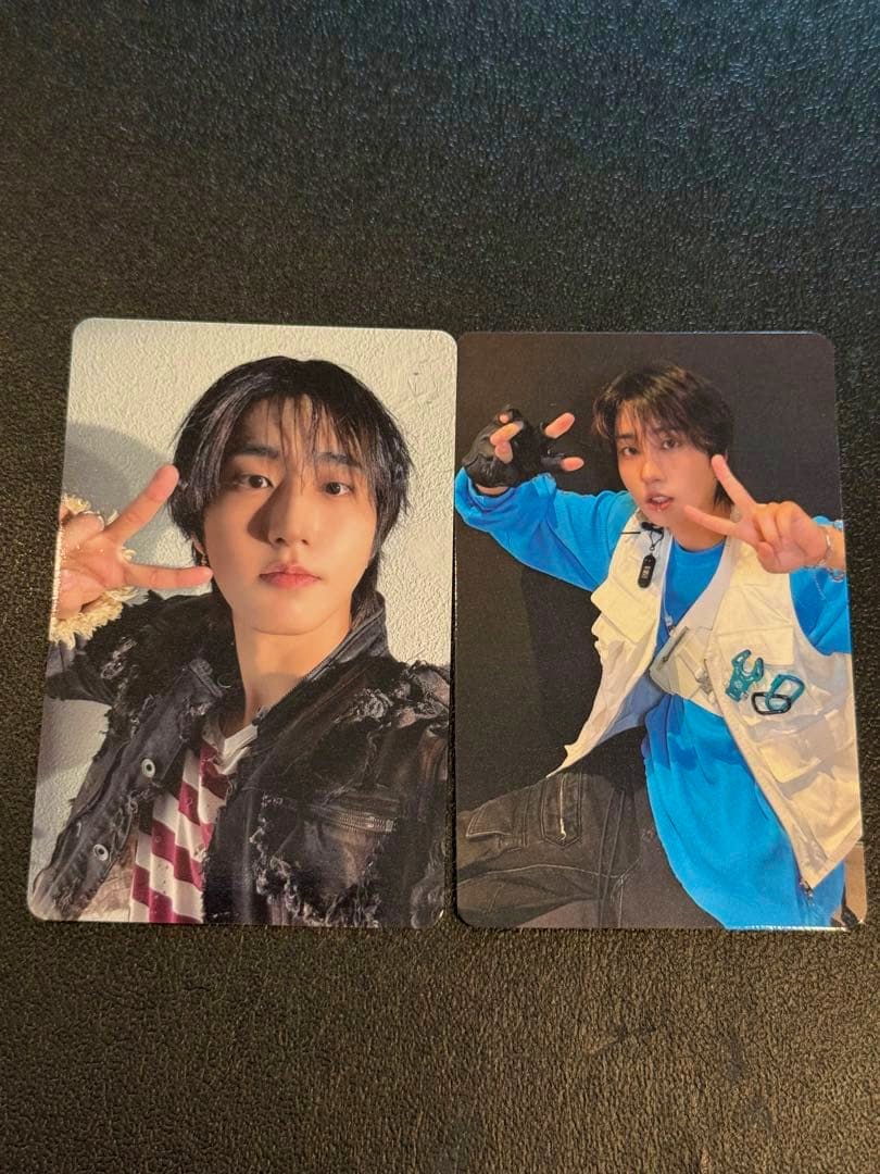 Two THIS&THAT photocards placed side by side on a dark textured surface.