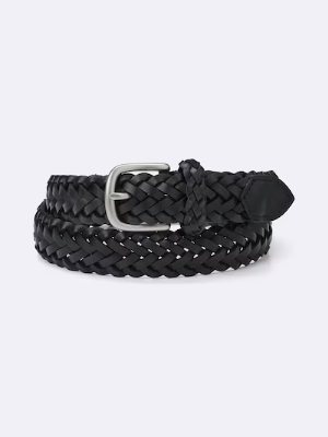 Black braided stretch belt with a silver metal buckle on a light background.
